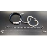 SELECTION OF FASHION JEWELLERY comprising a DKNY belcher link bracelet with T-bar clasp, a Swarovski