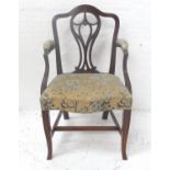 MAHOGANY ARMCHAIR with a shaped back and a shaped and pierced splat with husk decoration, the part