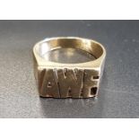 UNMARKED GOLD SIGNET RING with the letters 'AWF', ring size T-U and approximately 7.5 grams