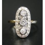 IMPRESSIVE ART DECO STYLE DIAMOND PLAQUE RING the diamonds in pierced oval setting totalling