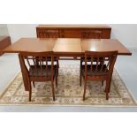 GREAVES & THOMAS TEAK DINING ROOM SUITE comprising an extending dining table with a pull apart top