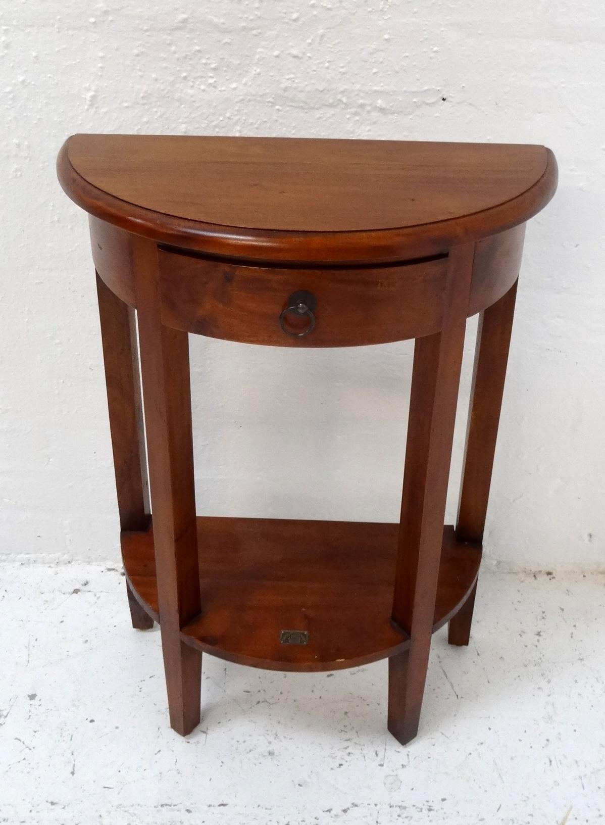 ANCIENT MARINER TEAK SIDE TABLE with a moulded D shape top above a frieze drawer, on four shaped