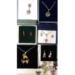 GOOD SELECTION OF SILVER JEWELLERY including an amethyst pendant on chain, boxed; a Celtic Lands
