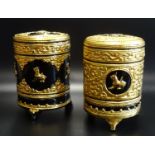 TWO CHINESE LACQUERED CIRCULAR TEA CADDIES of two section construction with lift off lids, decorated