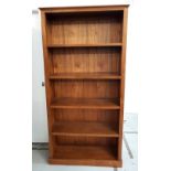 LARGE TEAK BOOKCASE with a moulded top above five shelves, standing on a plinth base, 197.5cm x 99cm