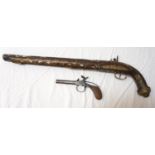 MIDDLE EASTERN FLINTLOCK PISTOL profusely inlaid with metal and brass decoration and with mother