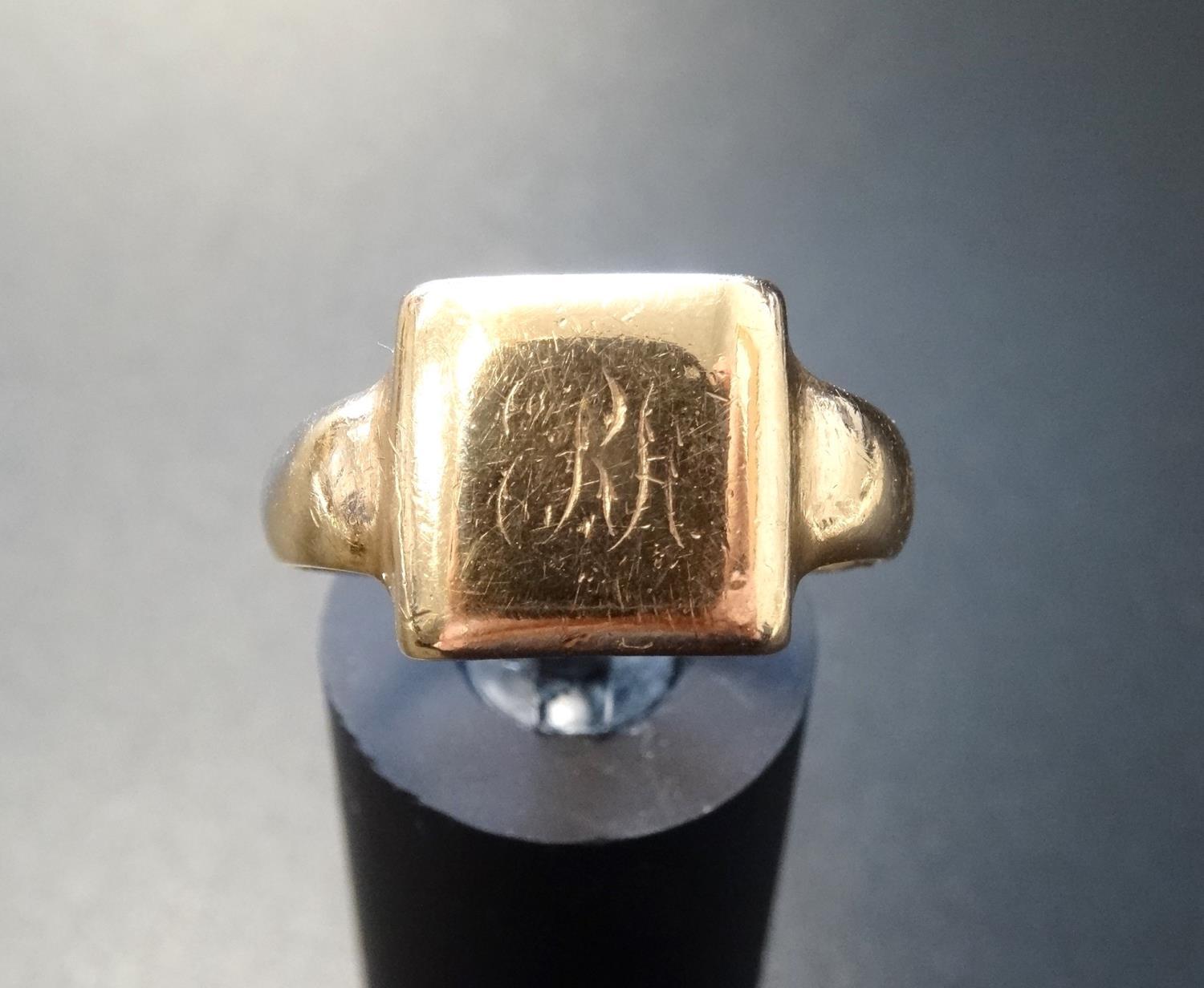 NINE CARAT GOLD SIGNET RING ring size Q and approximately 5.4 grams
