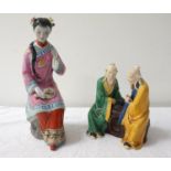 20TH CENTURY CHINESE FIGURE OF A SEATED LADY in traditional dress holding a mirror, 32cm high,