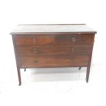 EDWARDIAN MAHOGANY AND INLAID CHEST with two short and two long drawers, standing on plain