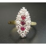 ART DECO STYLE DIAMOND AND RUBY CLUSTER RING the three central vertically set rubies in navette