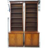 PAIR OF LARGE EDWARDIAN OAK AND MAHOGANY LIBRARY BOOKCASES each with a moulded dentil cornice with