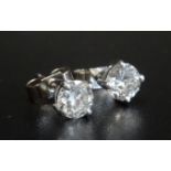 PAIR OF DIAMOND STUD EARRINGS the round brilliant cut diamonds totalling approximately 0.9cts, in