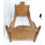 LATE VICTORIAN CONTINENTAL SINGLE BED with a shaped head and foot board marked A.M. 1893, with