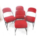 FOUR FOLDING METAL FRAME CHAIRS with shaped padded backs and seats, covered in plush red material