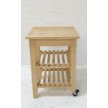 FREE STANDING BUTCHERS TYPE BLOCK with an oak and beech top above two slatted shelves, on shaped