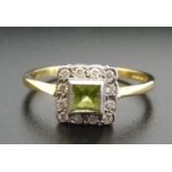 PERIDOT AND DIAMOND CLUSTER DRESS RING the central princess cut peridot in square surround set