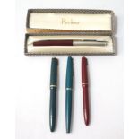 PARKER 51 CLASSIC FOUNTAIN PEN with a burgundy coloured body and a steel cap, two Parker 17 fountain