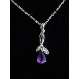 PRETTY AMETHYST AND DIAMOND PENDANT the pear cut amethyst drop below the entwined diamond set