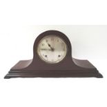 GERMAN MANTLE CLOCK with a mahogany case and silvered dial with Arabic numerals, the eight day