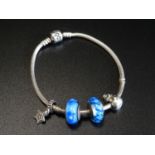 PANDORA MOMENTS SILVER CHARM BRACELET with four Pandora charms including two glass bead examples and