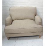 OVERSIZED MODERN ARMCHAIR with a shaped back with loose back and seat cushion, covered in a speckled