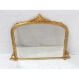 19th CENTURY GILTWOOD OVERMANTLE MIRROR with a central carved shell and scroll pediment above the