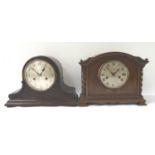 GERMAN MANTLE CLOCK with a shaped mahogany case and circular silvered dial with Arabic numerals, the