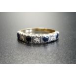 SAPPHIRE AND DIAMOND SEVEN STONE HALF ETERNITY RING with alternating round cut sapphires and