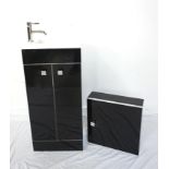 NEW AND UNUSED PORCELAIN SINK and unit, with a mixed tap, mounted in a narrow black gloss base