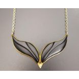 UNUSUAL 1980s NINE CARAT GOLD , DIAMOND AND BLACK RESIN NECKLACE on attached nine carat gold