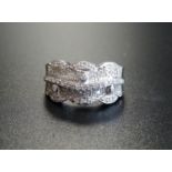 MULTI PAVE SET DIAMOND DRESS RING the diamonds in wavy and shaped setting, in nine carat white gold,