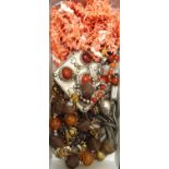 SELECTION OF JEWELLERY comprising three coral necklaces; a stone set necklace with large white metal