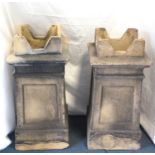 PAIR OF SQUARE FORM CHIMNEY POTS with panel detail below a geometric form top, 72cm high (2)