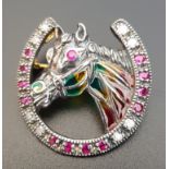 DIAMOND AND RUBY SET HORSE BROOCH the horse with colourful filled panels and ruby eyes, within