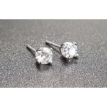 PAIR OF DIAMOND STUD EARRINGS the round brilliant cut diamonds approximately 0.25cts each, in nine