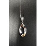 DIAMOND SET NAVETTE SHAPED PENDANT in nine carat white gold and on nine carat white gold chain