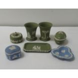 SELECTION OF WEDGWOOD JASPERWARE comprising a pair of green ground trumpet vases, two section egg,