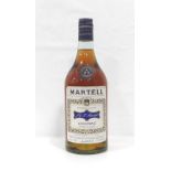 MARTELL 3 STAR COGNAC CIRCA 1970 An older bottle of Martell 3 star Cognac from the early 1970s. 24