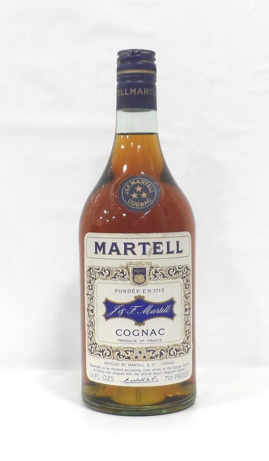 MARTELL 3 STAR COGNAC CIRCA 1970 An older bottle of Martell 3 star Cognac from the early 1970s. 24