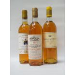 SELECTION OF THREE BOTTLES OF VINTAGE SAUTERNES A trio of bottles of Vintage Sauternes,