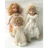 THREE BISQUE HEAD DOLLS, one marked Reginy 451, the other two on stands (3)