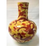 CHINESE DRAGON VASE early 20th century, with a cylindrical neck and bulbous body, decorated with red