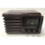 FULLOTONE BAKELITE RADIO in a shaped case with a square tuning window with three dials below, 38cm