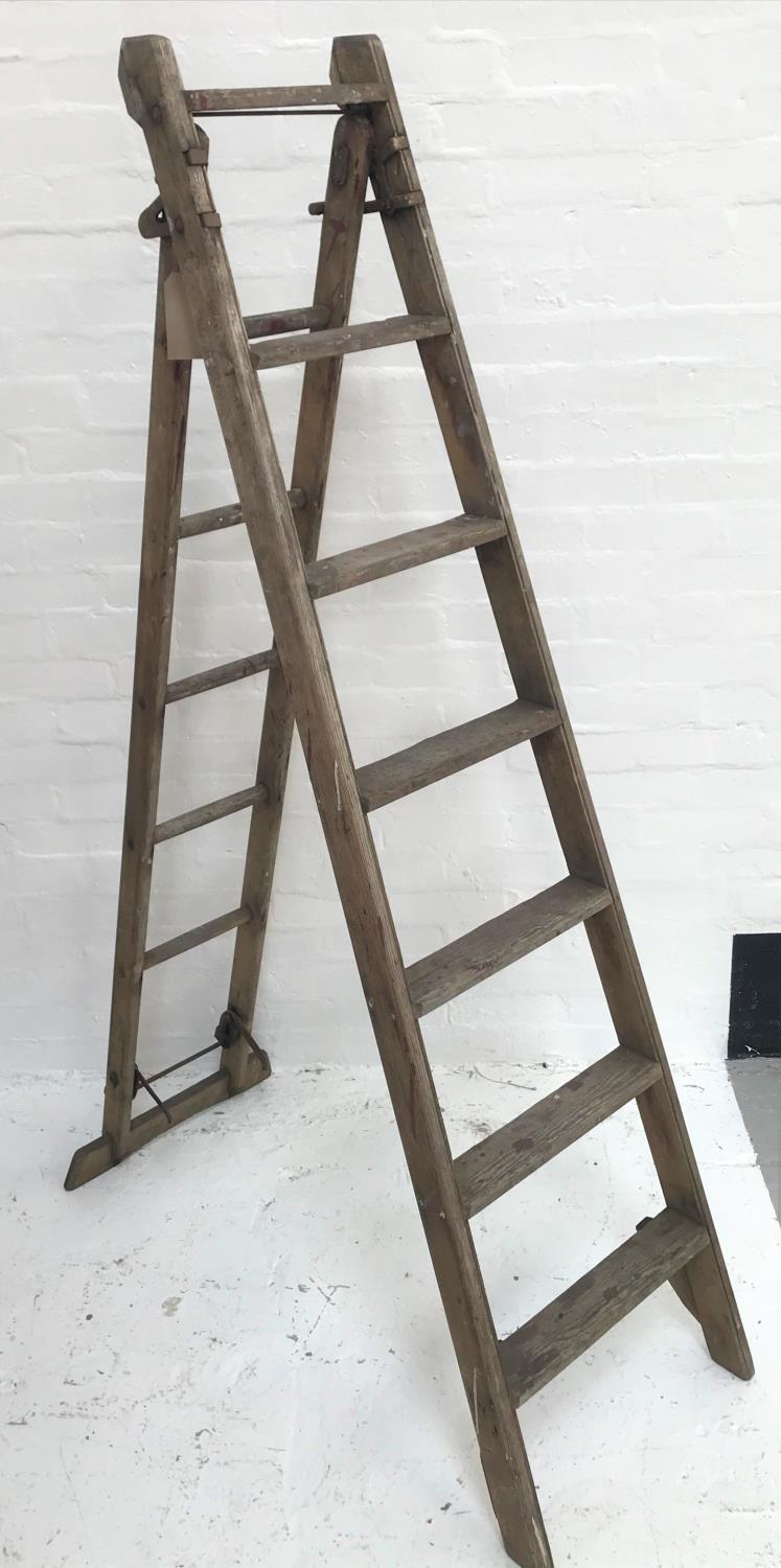 VINTAGE EXTENDING WOODEN STEP LADDER of metamorphic design