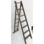 VINTAGE EXTENDING WOODEN STEP LADDER of metamorphic design