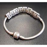 PANDORA MOMENTS SILVER CHARM BRACELET with eight Pandora letter charms spelling 'Isabelle'