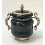 NEPHRITE JAR AND COVER of squat bulbous form, the lid with a silver finial and rim, the jar with a