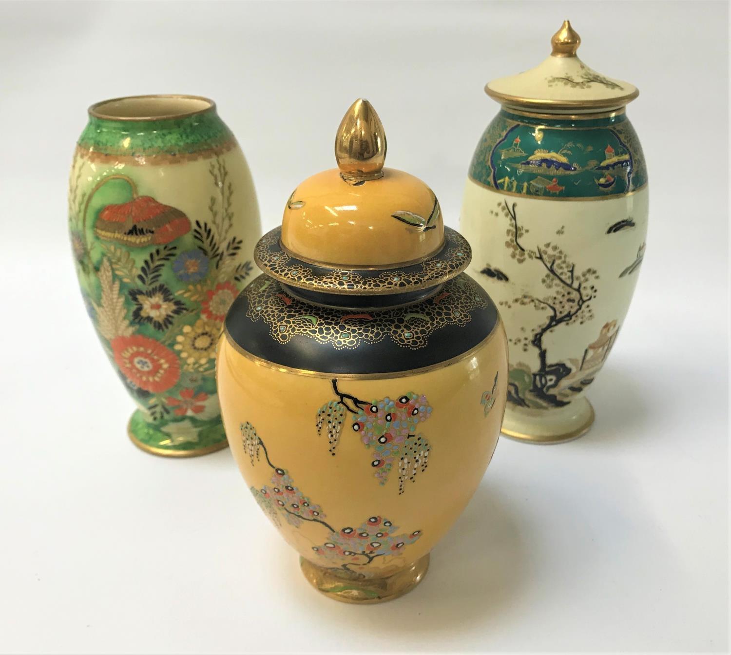 THREE PIECES OF ART DECO CARLTON WARE comprising a 'Paradise Bird & Tree' pattern jar and cover on a