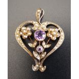 EDWARDIAN AMETHYST AND SEED PEARL HOLBEIN PENDANT the central two amethysts in seed pearl set scroll