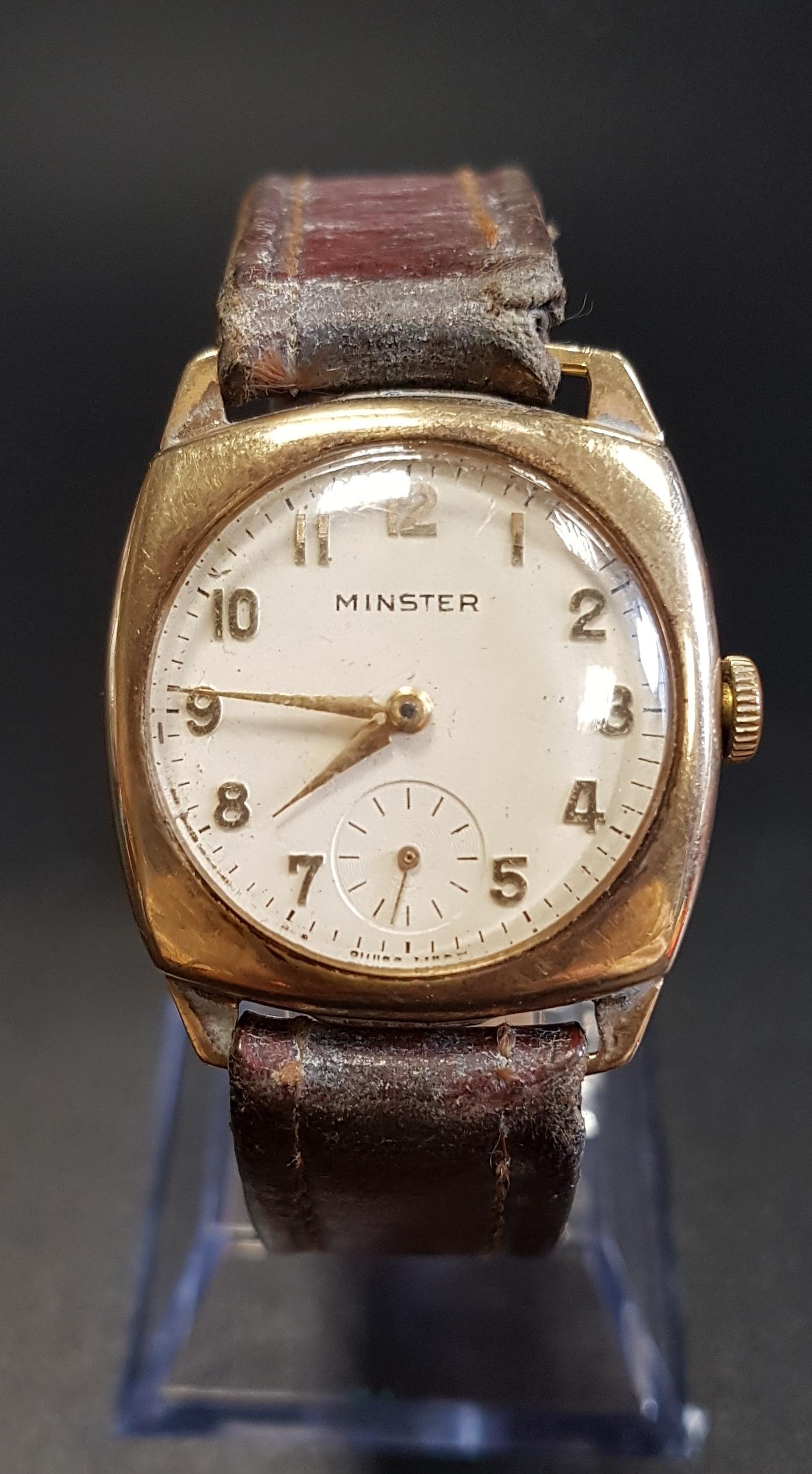 NINE CARAT GOLD CASED MINSTER WRISTWATCH the cream dial with Arabic numerals and subsidiary